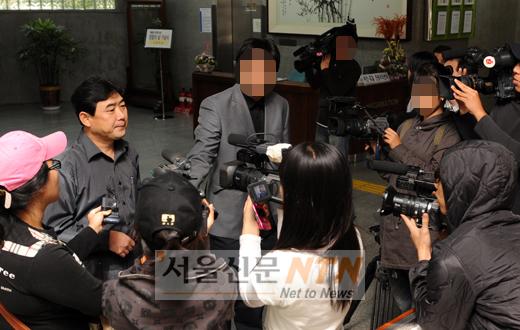 故안재환 누나, 경찰 진정인 조사 불참