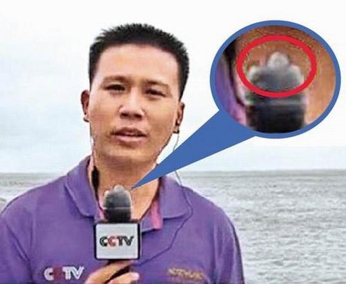 中CCTV 기자, 마이크에 콘돔씌우고 생방송 물의