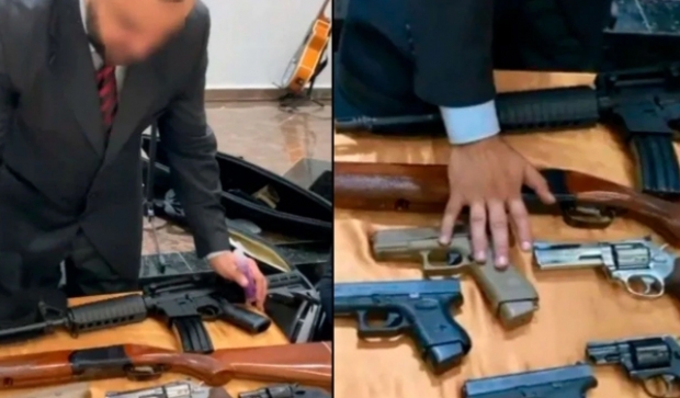 “무기여, 우리를 지켜다오” 총에게 안수하는 개신교 목사