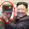 [포착] 불편 그 자체…김정은에 안긴 북한 학생의 얼어붙은 표정