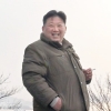 [포착] 北 김정은, 담배 들고 함박웃음…“고출력 고체엔진 시험 성공”