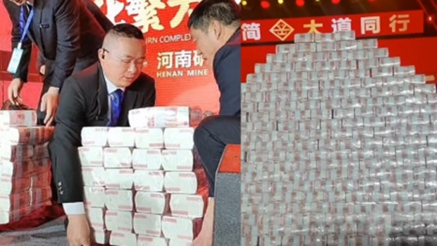 “들고가라”…현금을 산처럼 쌓아놓고 직원들에 포상금 준 中 회사