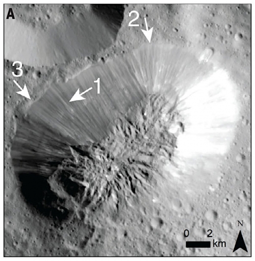 던 탐사선이 촬영한 아후나 몬스의 지형. 화살표는 산에 있는 균열과 흘러내린 물질. / Dawn Science Team and NASA/JPL-Caltech/GSFC