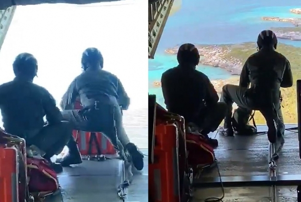 헬기에서 구호물자를 내려보내는 미 해안경비대