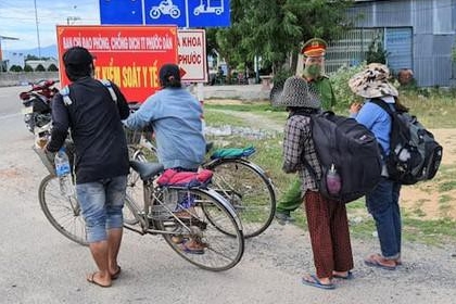 [여기는 베트남] 코로나19로 실업자 된 4인 가족, 자전거 타고 1300km 귀향길