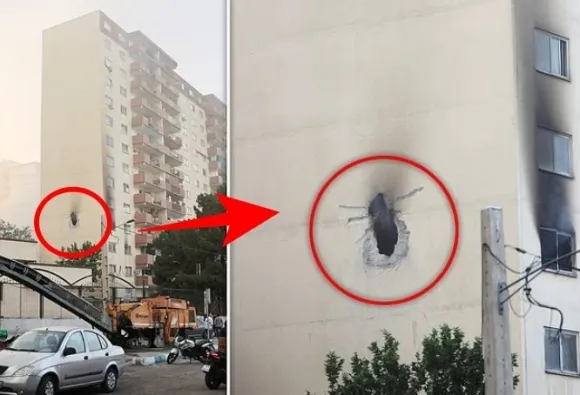 주거용으로 보이는 이란 수도 테헤란 인근 아파트 외벽에 미사일 또는 드론 공습 과정에서 생긴 것으로 추정되는 거대한 구멍이 나 있다. 2025. 06. 12 로이터 연합뉴스 주거용으로 보이는 이란 수도 테헤란 인근 아파트 외벽에 미사일 또는 드론 공습 과정에서 생긴 것으로 추정되는 거대한 구멍이 나 있다. 2025. 06. 12 로이터 연합뉴스