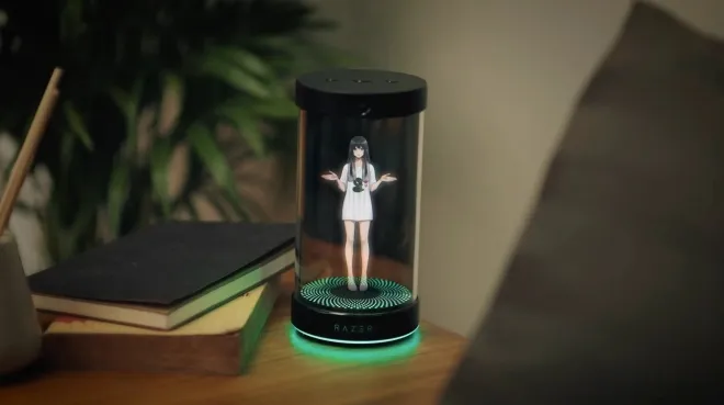 미국 라스베이거스에서 열린 CES 2026에서 공개된 레이저의 3D 홀로그램 AI 동반자 ‘프로젝트 에이바’. 유리병 형태의 디스플레이 안에 구현된 AI 캐릭터가 책상 위에 배치돼 일정 관리와 업무·생활 보조 기능을 수행하는 콘셉트다. 레이저 제공