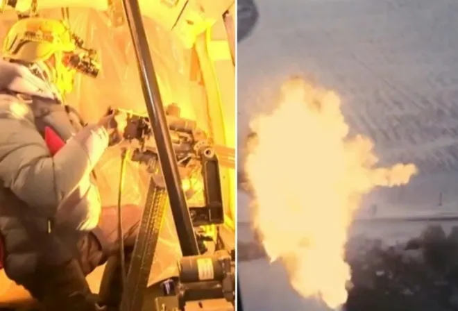 수송기를 타고 공중에서 이동하며 러시아군 드론을 격추하는 우크라이나 병사의 모습. 우크라이나군 제공